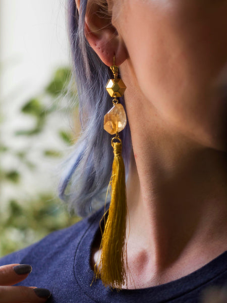 Auxo asymmetric silky tassel golden tone brass earrings