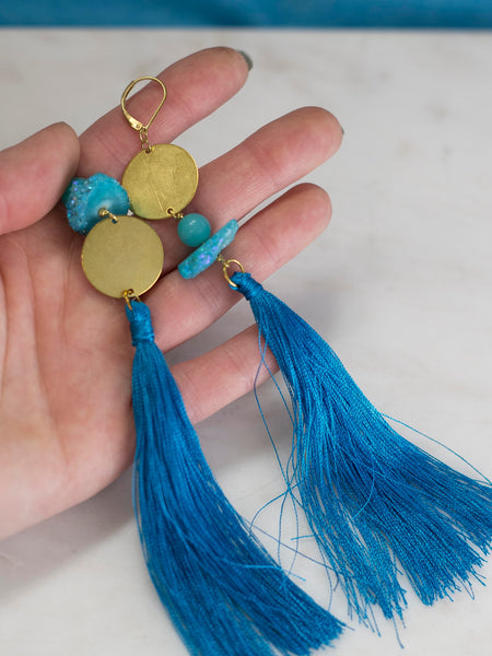 Marici asymmetric blue tassel golden tone brass earrings