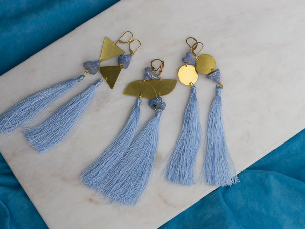 Surya asymmetric blue tassel golden tone brass earrings