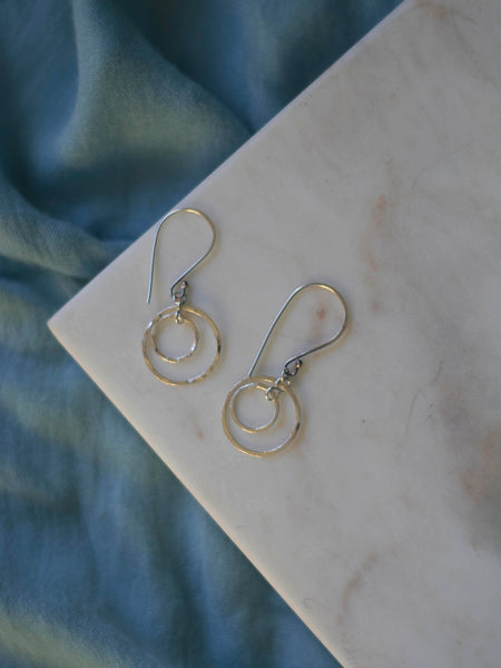 Orbital hoop geometrical silver earrings